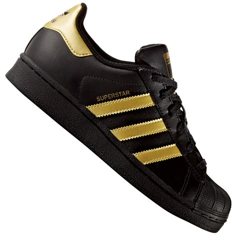 adidas schuhe schwarz rot gold|adidas schuhe mit goldenen streifen.